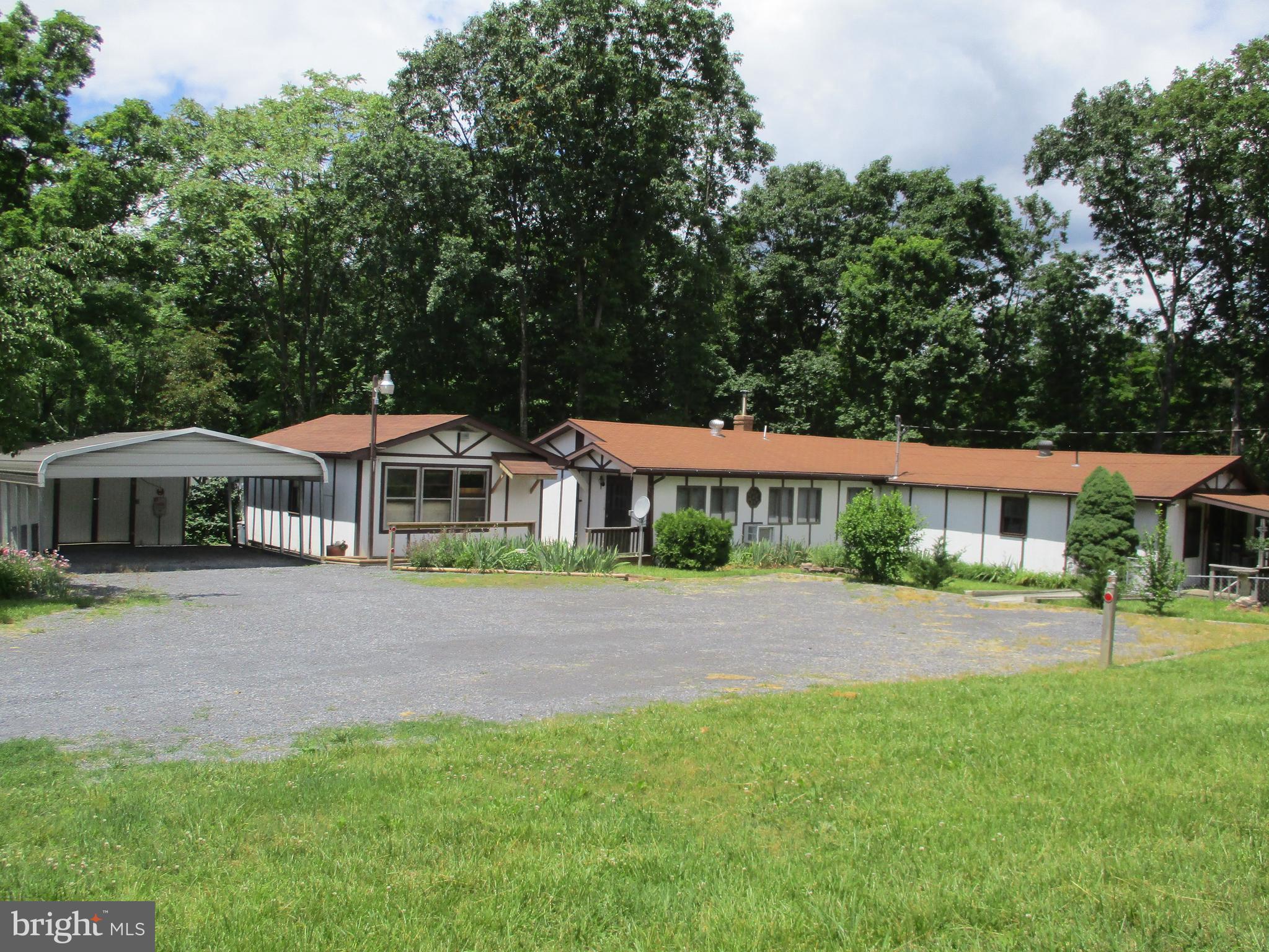 1295 Pious Ridge Road Berkeley Springs, WV 25411 - Photo 1 of 28 Exterior (Front)