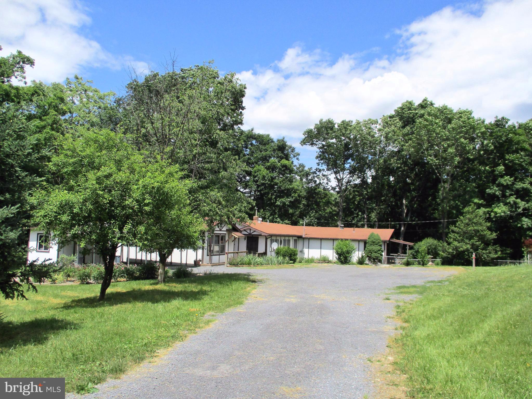 1295 Pious Ridge Road Berkeley Springs, WV 25411 - Photo 2 of 28 Exterior (Front)
