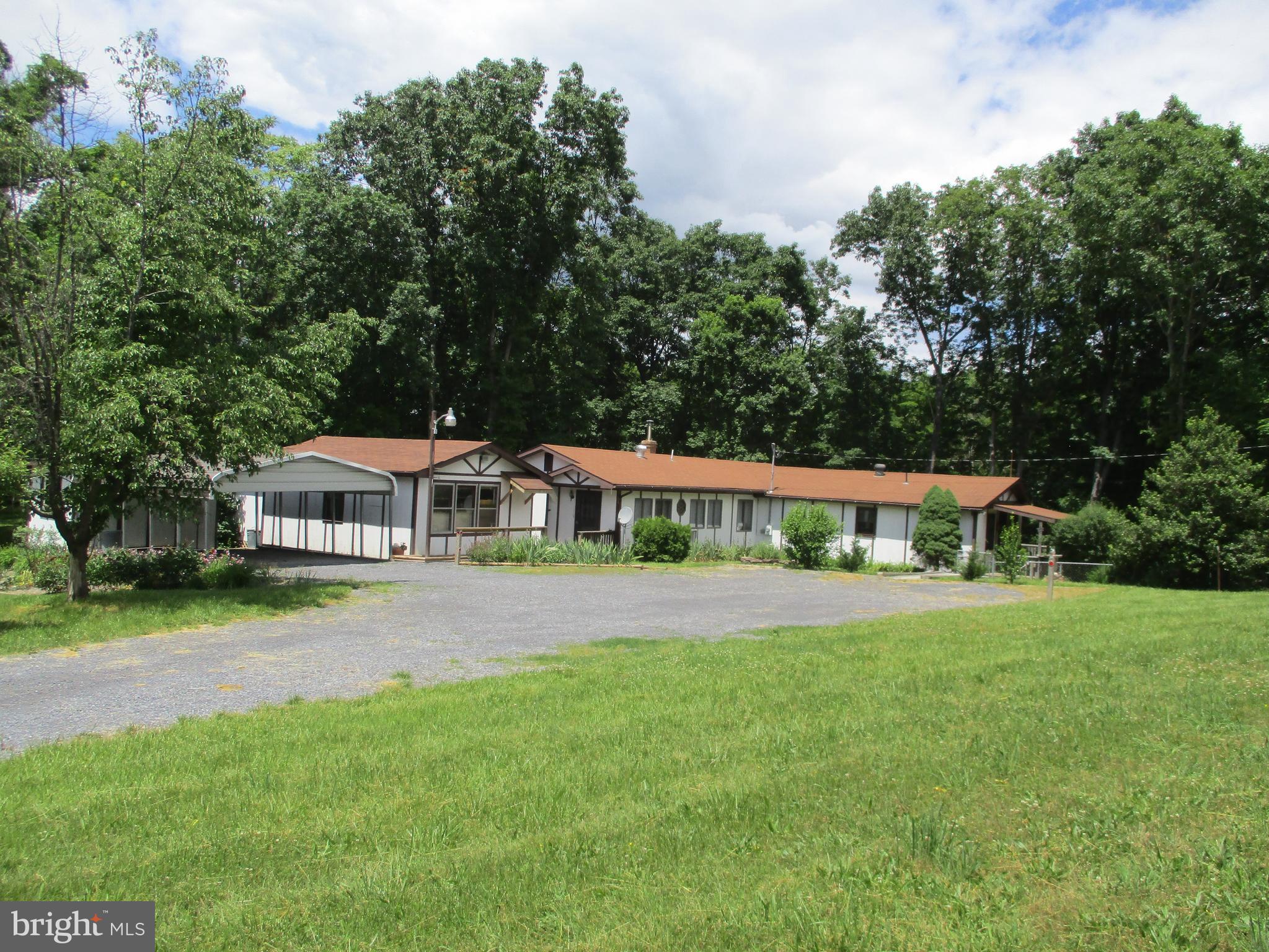 1295 Pious Ridge Road Berkeley Springs, WV 25411 - Photo 3 of 28 Exterior (Front)
