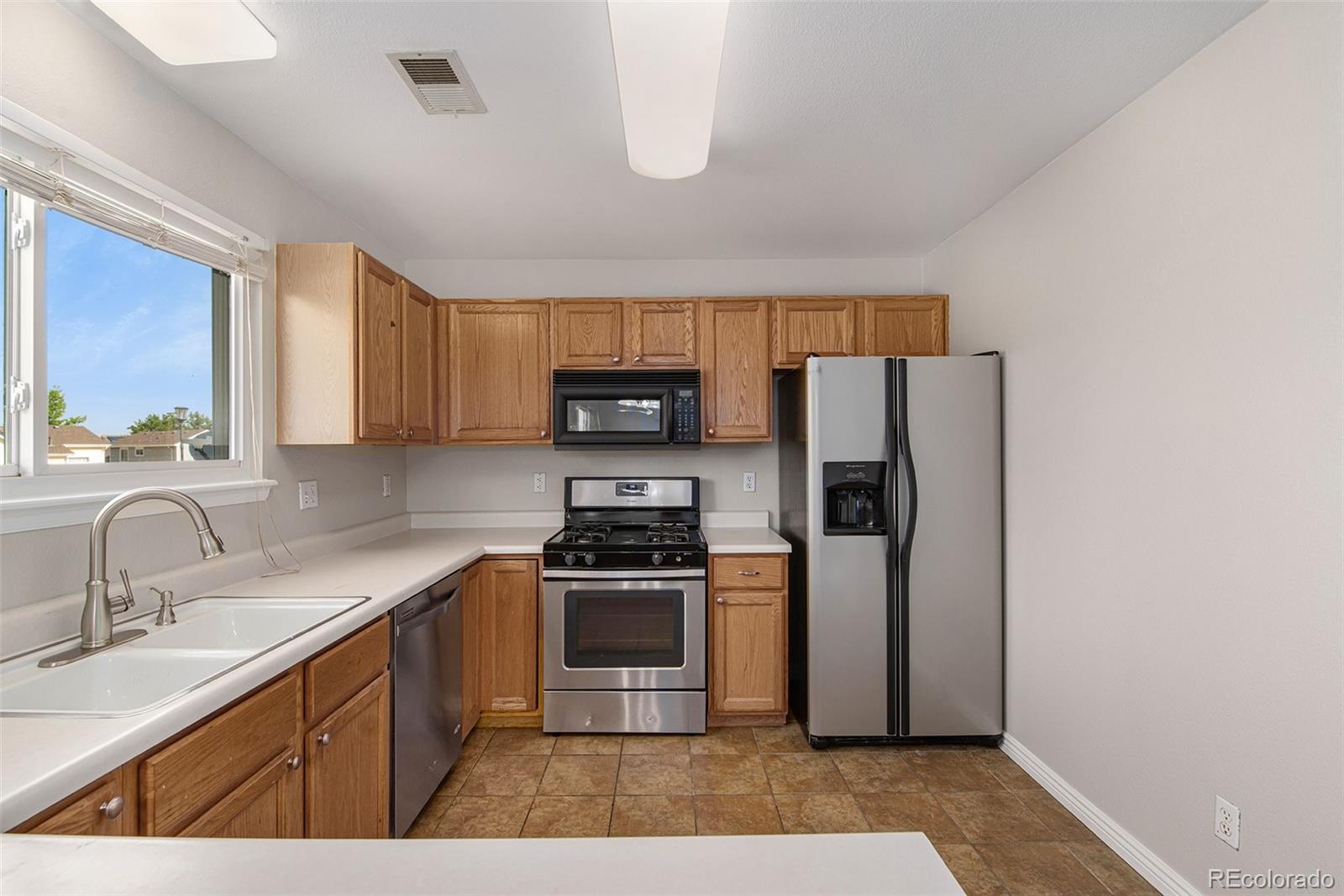 4107 Dunkirk Court Denver, CO 80249 - Photo 9 of 18