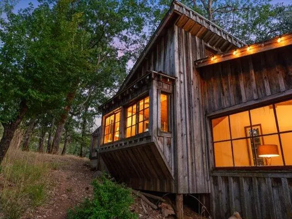 a front view of a house with a porch
