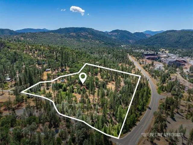 a view of balcony with wooden floor and outdoor seating