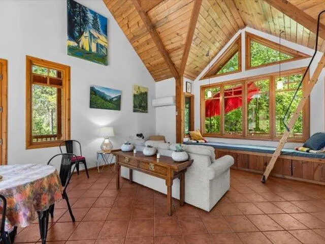 a kitchen with stainless steel appliances a stove a sink and a counter space