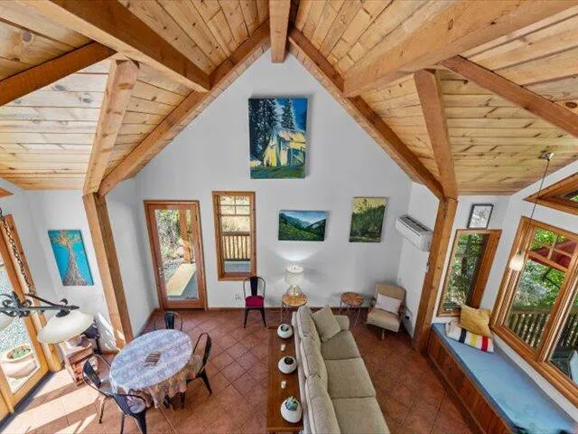 a kitchen with stainless steel appliances granite countertop a stove and a wooden cabinets