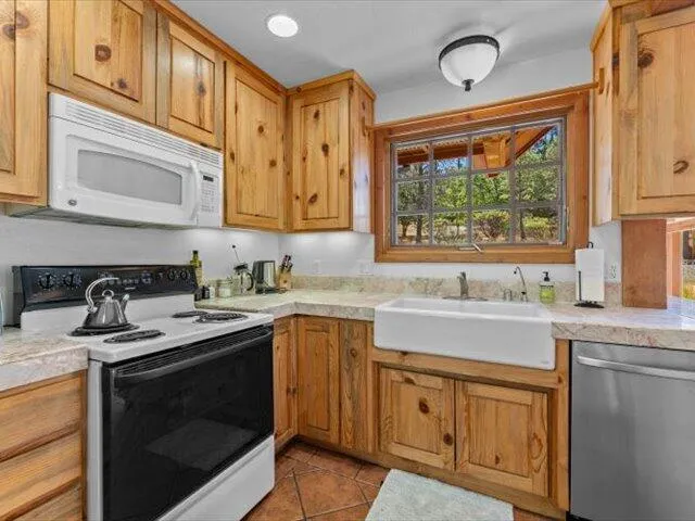 a bathroom with a sink vanity and a mirror