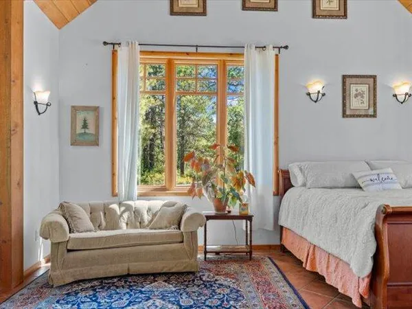 a view of a room with a window and outside view