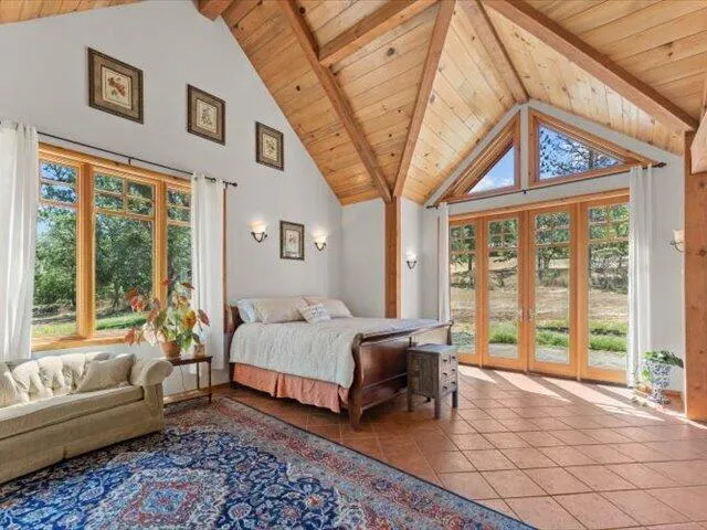 a view of a swimming pool with an outdoor space and seating area