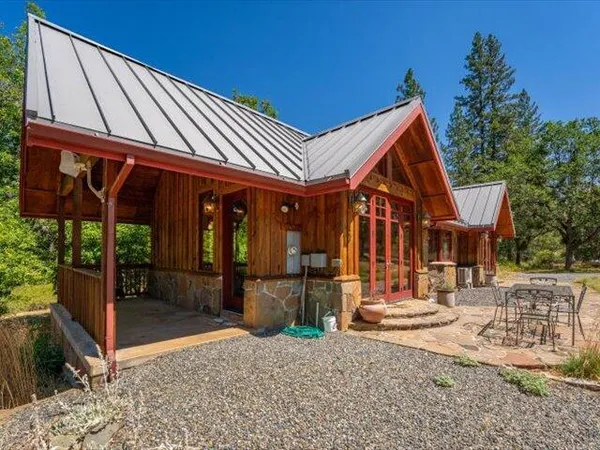 a view of an empty room with windows