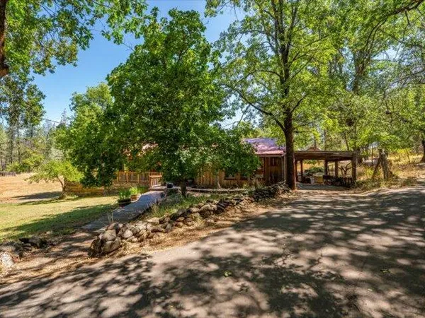 a view of a town with mountains in the background