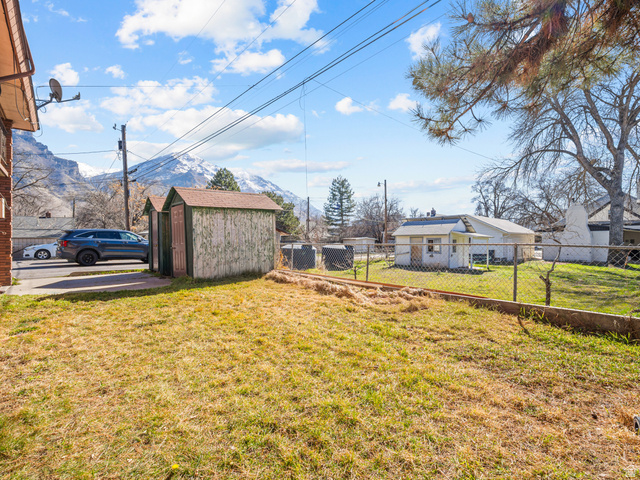 460 200 South Provo, UT 84606 - Photo 64 of 66 Fenced backyard featuring a storage unit
