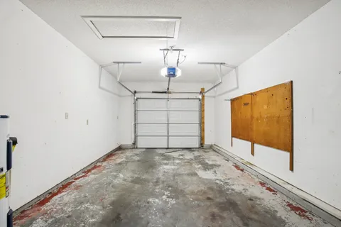 a view of a two chairs on the roof deck