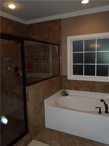 7779 Lowe Road Christiana, TN 37037 - Photo 15 of 20 Huge walk-in shower with 2 shower heads, tiled and tons of room...