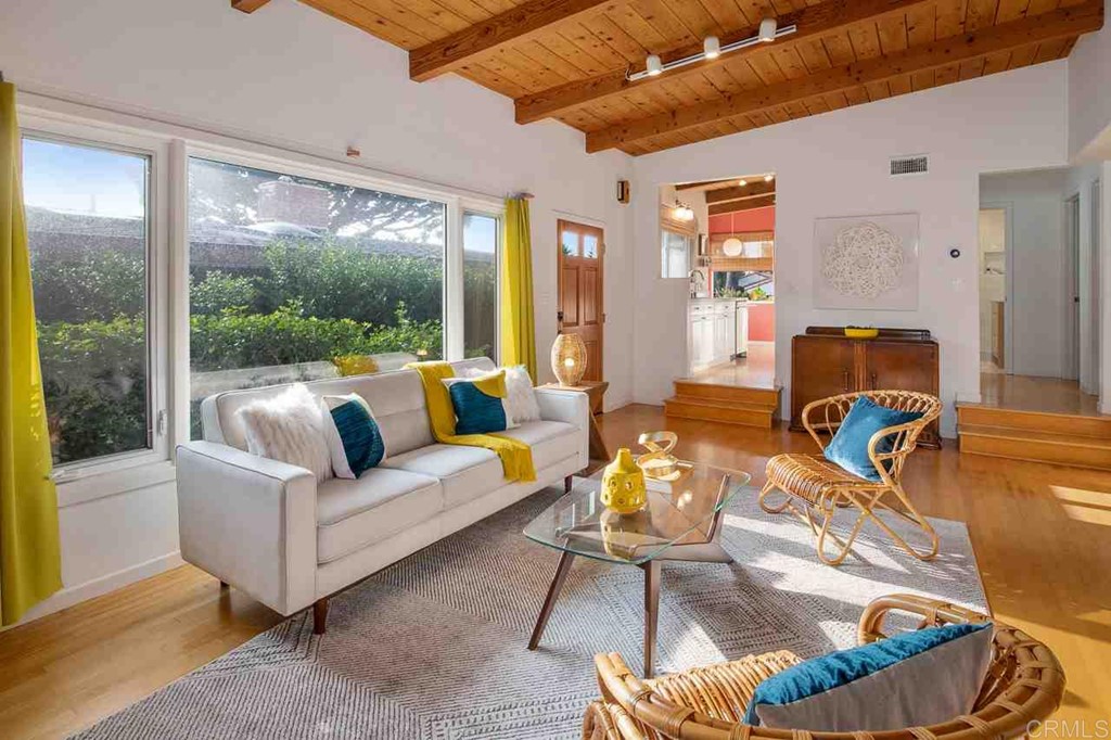 405 9th Street Del Mar, CA 92014 - Photo 6 of 25 a living room with furniture and a large window