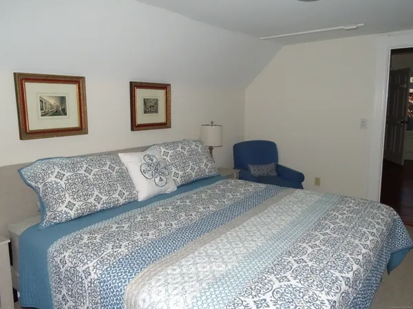 a bathroom with a shower and a sink