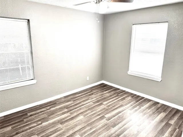 a view of a room that has a window in it