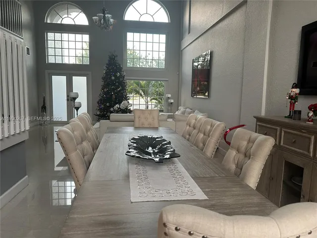 a living room with furniture fireplace and a flat screen tv