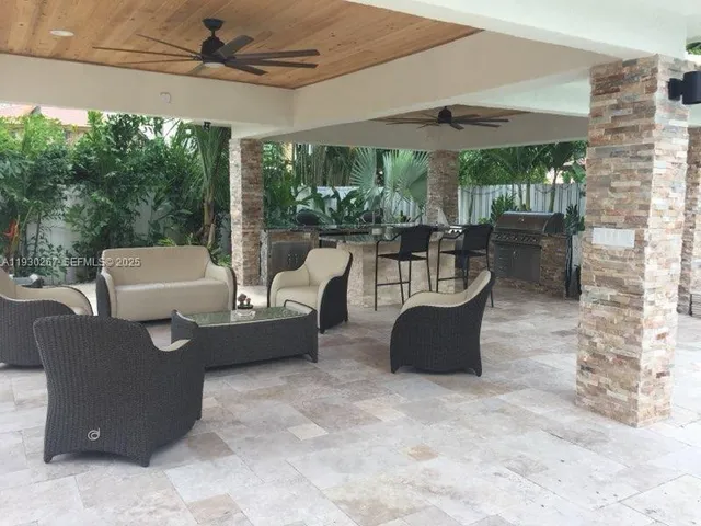 a outdoor living space with furniture and garden view