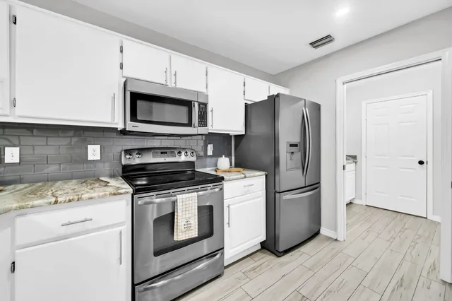 a view of a room with racks on the wall