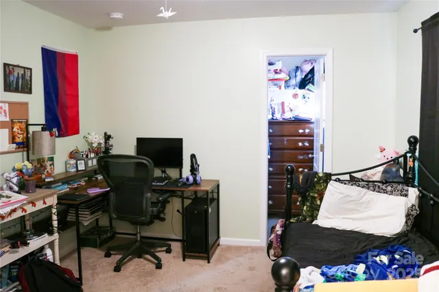 a bathroom with a sink vanity and a mirror