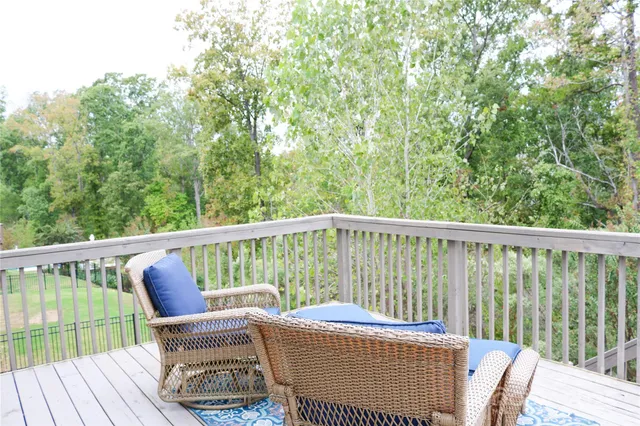 a view of a chair in wooden deck