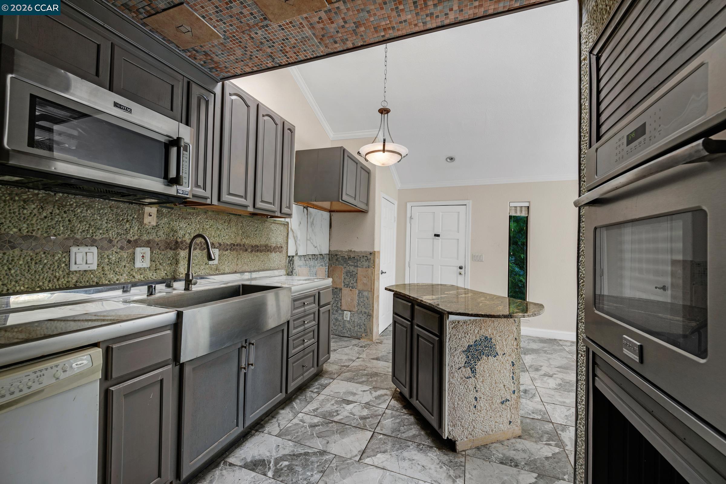 1544 Bailey Road, Unit 30 Concord, CA 94521 - Photo 13 of 33 a kitchen with stainless steel appliances granite countertop a sink stove and refrigerator
