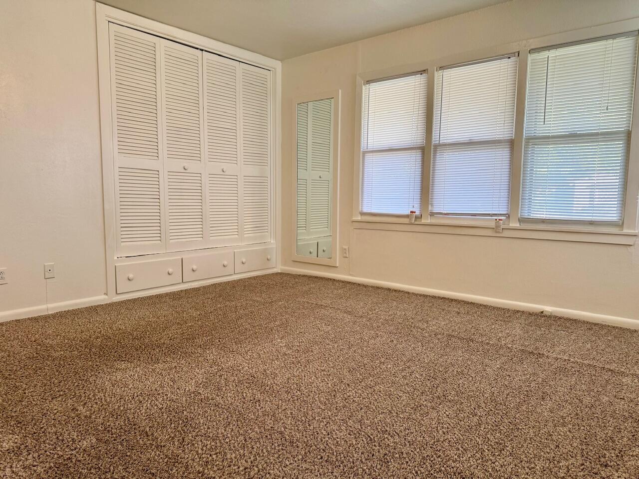 4001 32nd Street Lubbock, TX 79410 - Photo 9 of 21 an empty room with a window