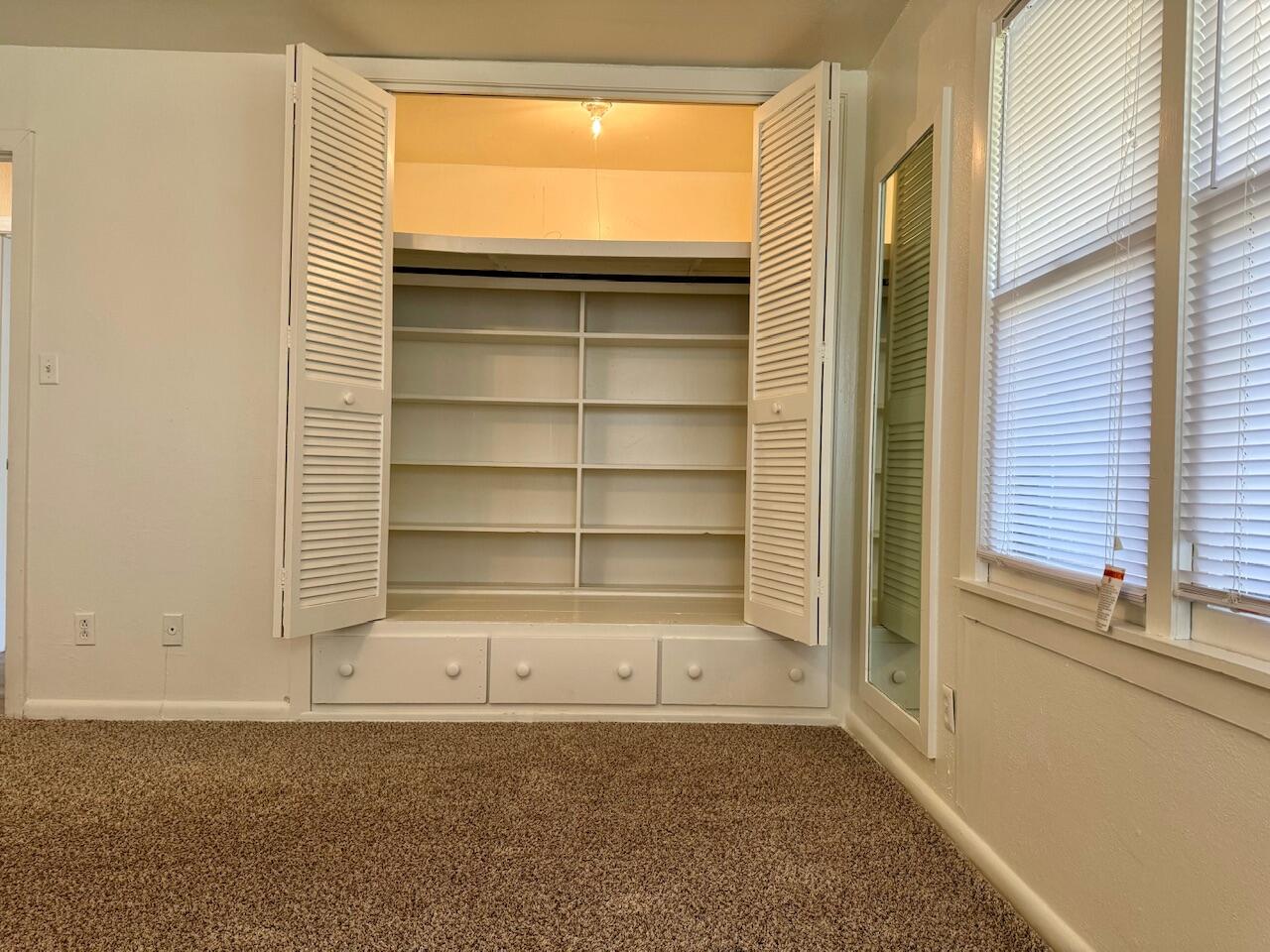 4001 32nd Street Lubbock, TX 79410 - Photo 10 of 21 a view of an empty room with a window