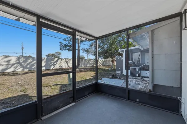 a view of an empty room and window
