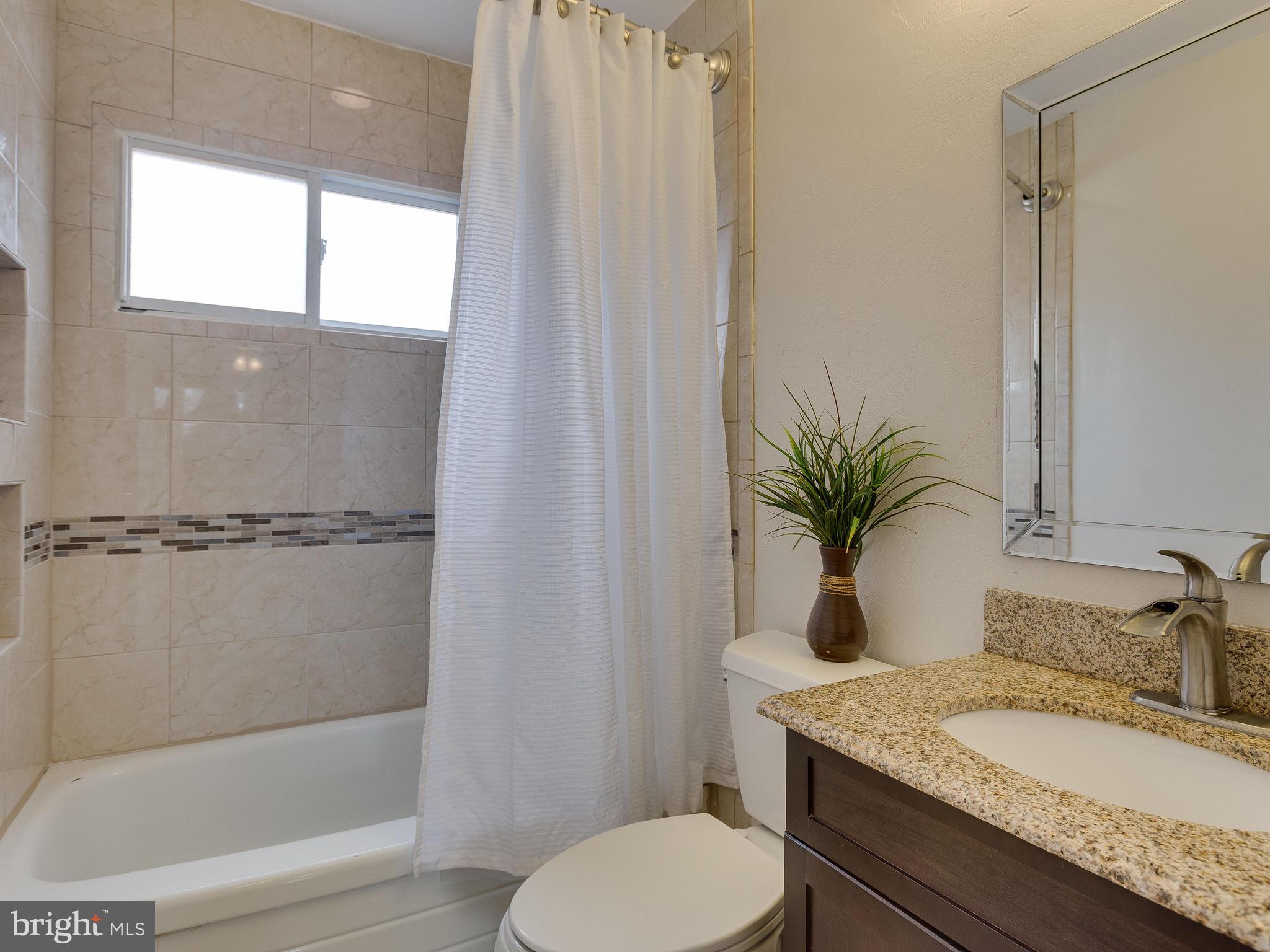 628 Beech Road Sterling, VA 20164 - Photo 15 of 30 2017 Hall Bath Renovation - Granite+ Custom Tile