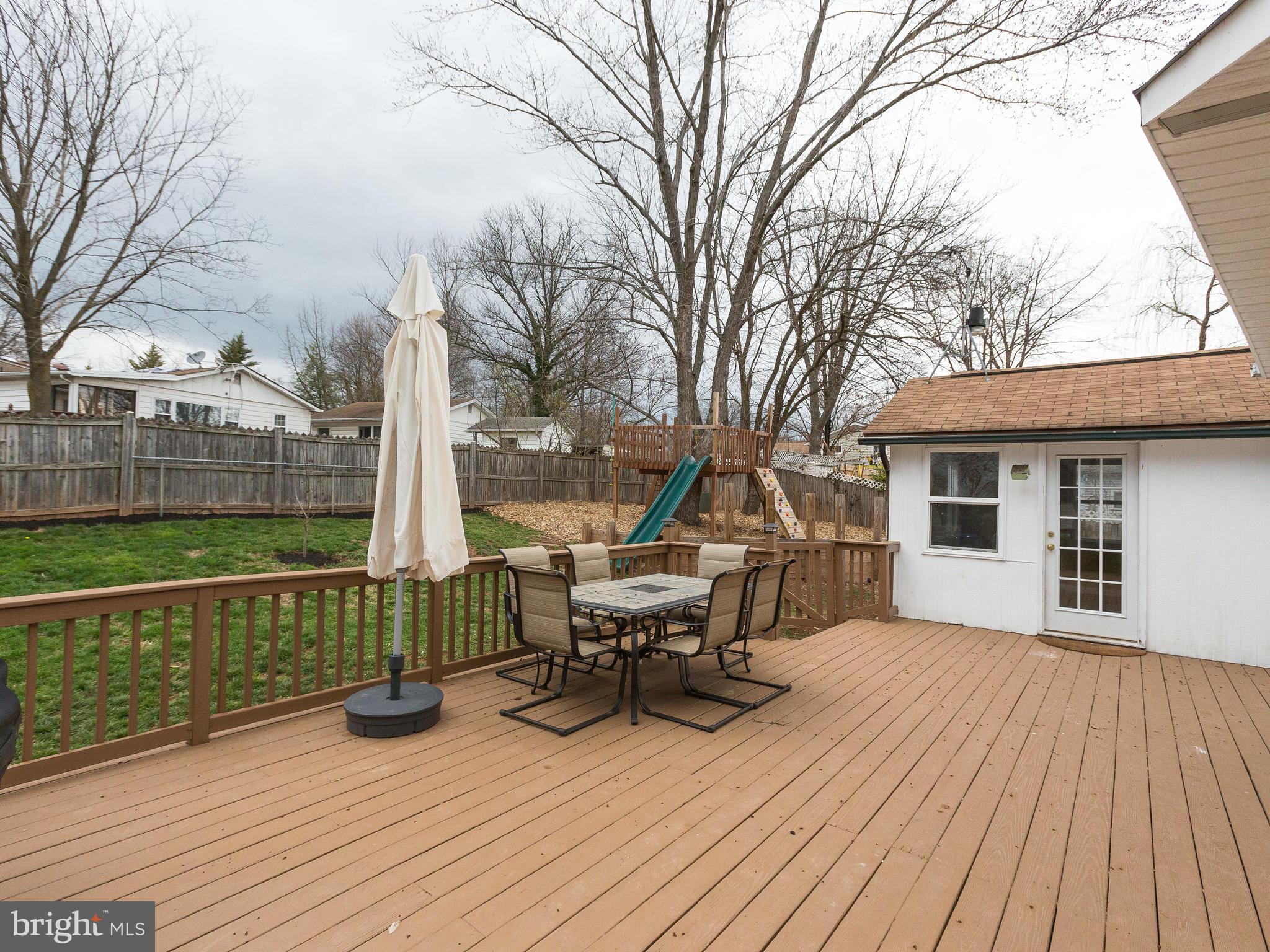628 Beech Road Sterling, VA 20164 - Photo 21 of 30 Large Wood Deck Plus Spacious Fenced Rear Yard