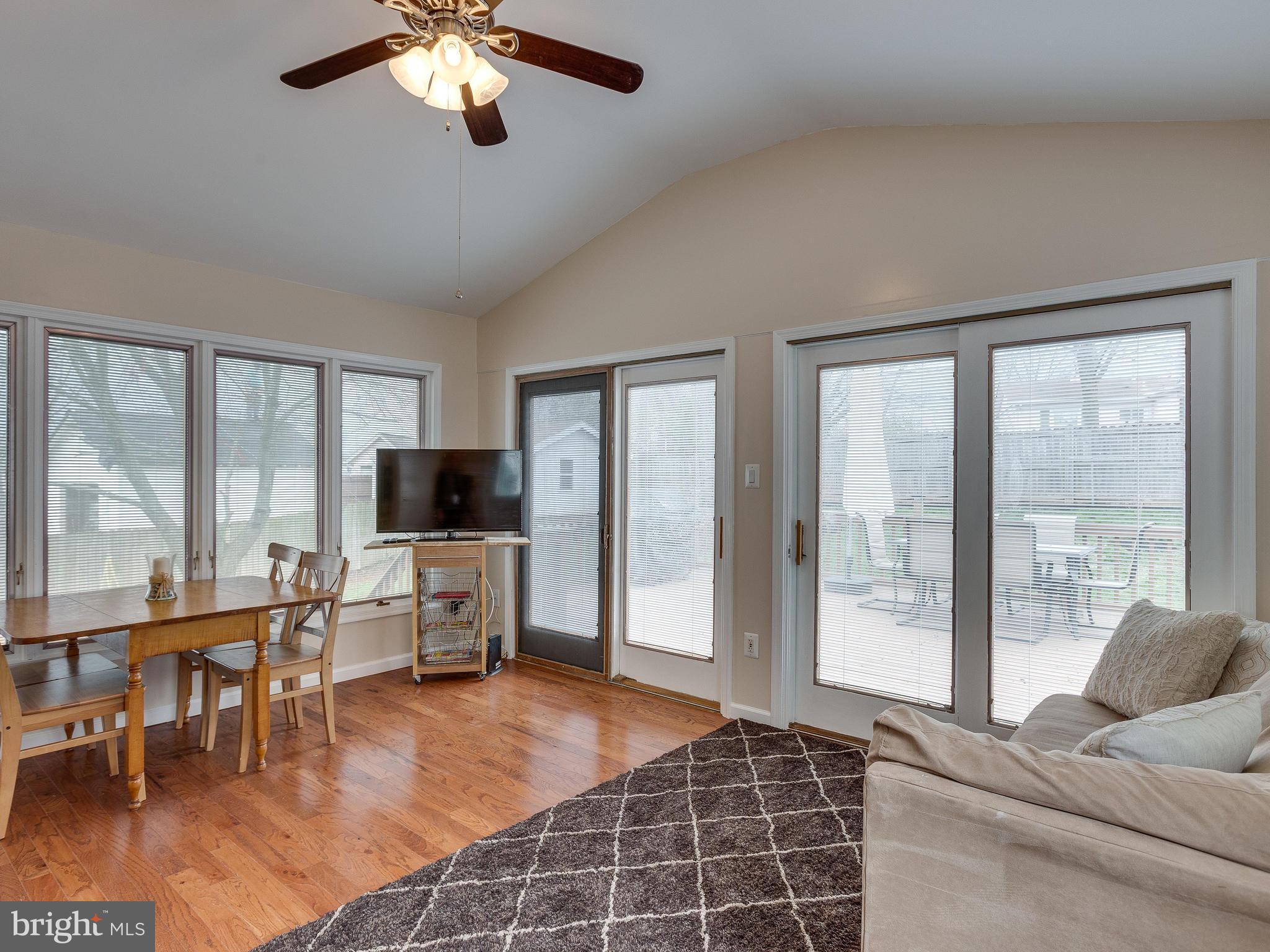 628 Beech Road Sterling, VA 20164 - Photo 10 of 30 Family Room Slider to Wood Deck + Fenced Rear Yard