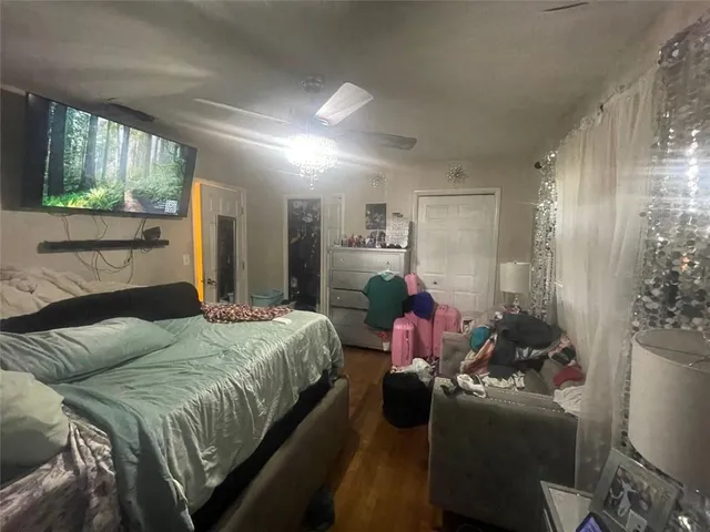 a bed room with a bed and a couch