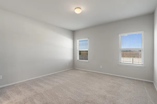 a kitchen with granite countertop cabinets stainless steel appliances and wooden cabinets