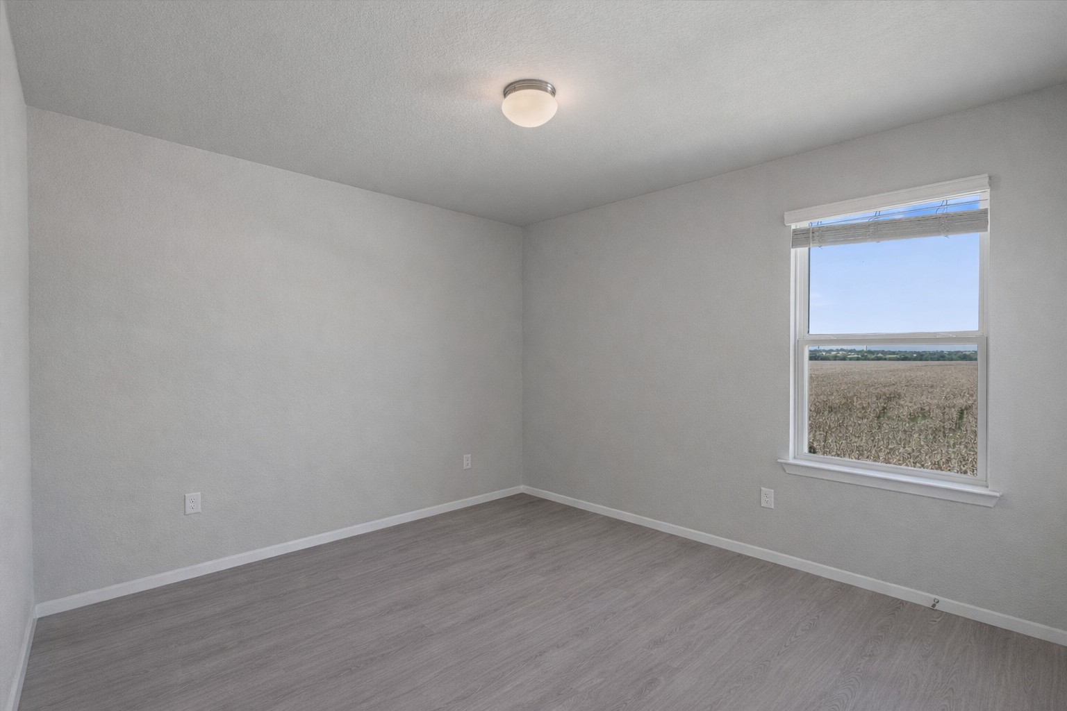 2711 Winding Creek Road Kyle, TX 78640 - Photo 26 of 33 an empty room with a window