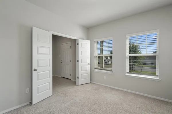 an empty room with windows