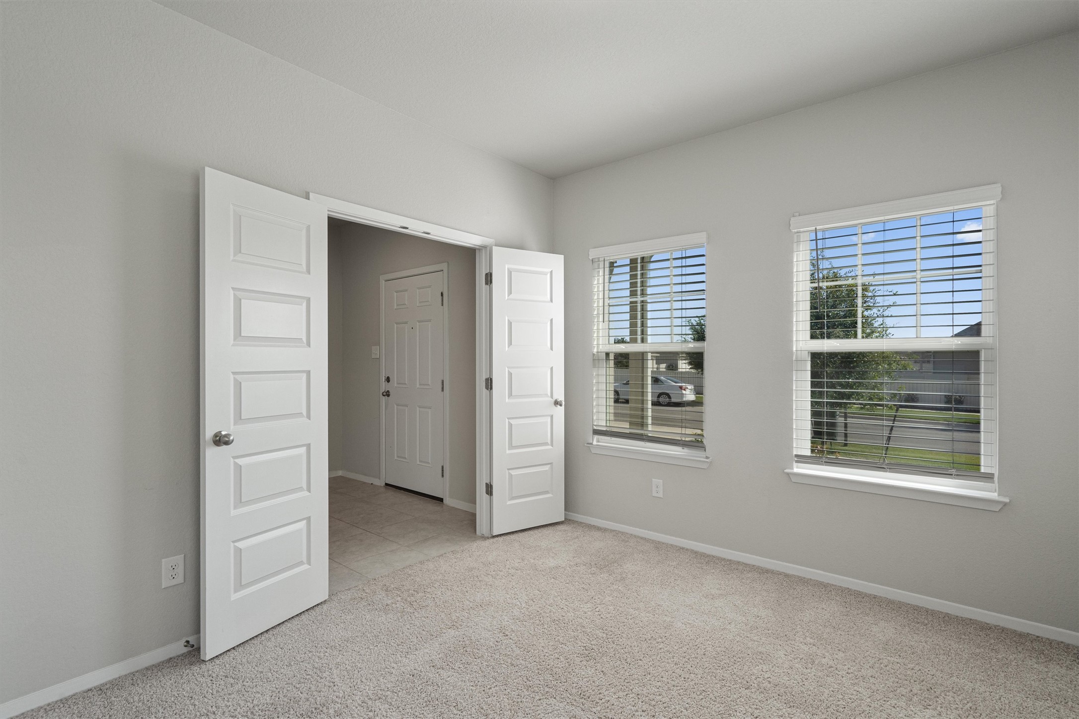 2711 Winding Creek Road Kyle, TX 78640 - Photo 5 of 34 an empty room with windows