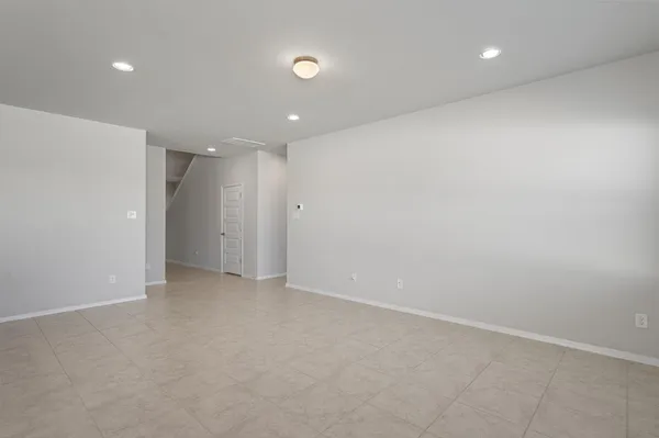 an empty room with an entryway