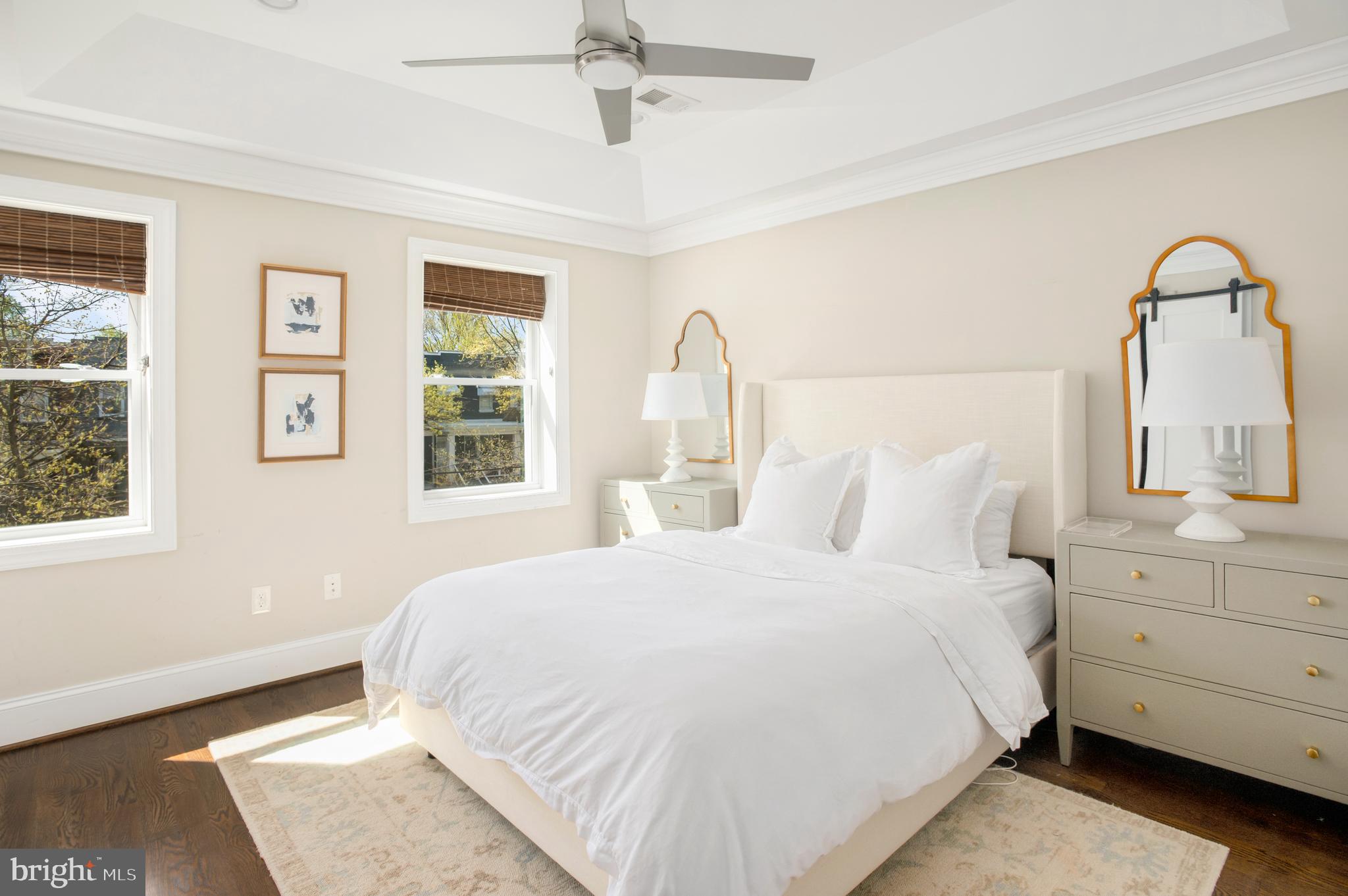 717 Hamilton Street Northwest Washington, DC 20011 - Photo 12 of 27 a bedroom with a bed and a window