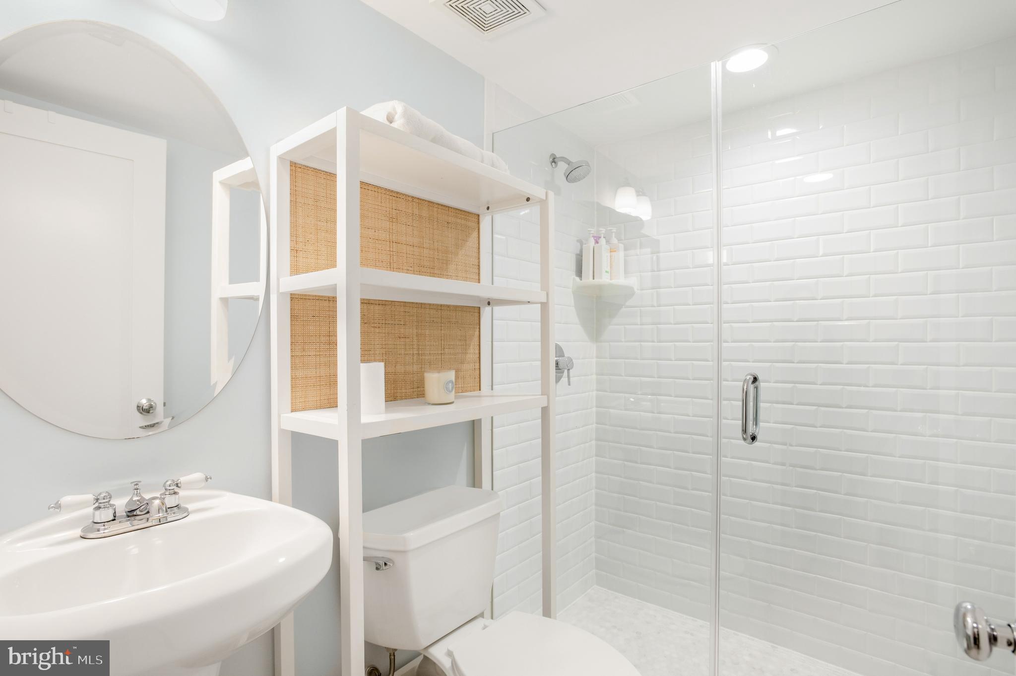 717 Hamilton Street Northwest Washington, DC 20011 - Photo 20 of 27 a bathroom with a sink a toilet and shower