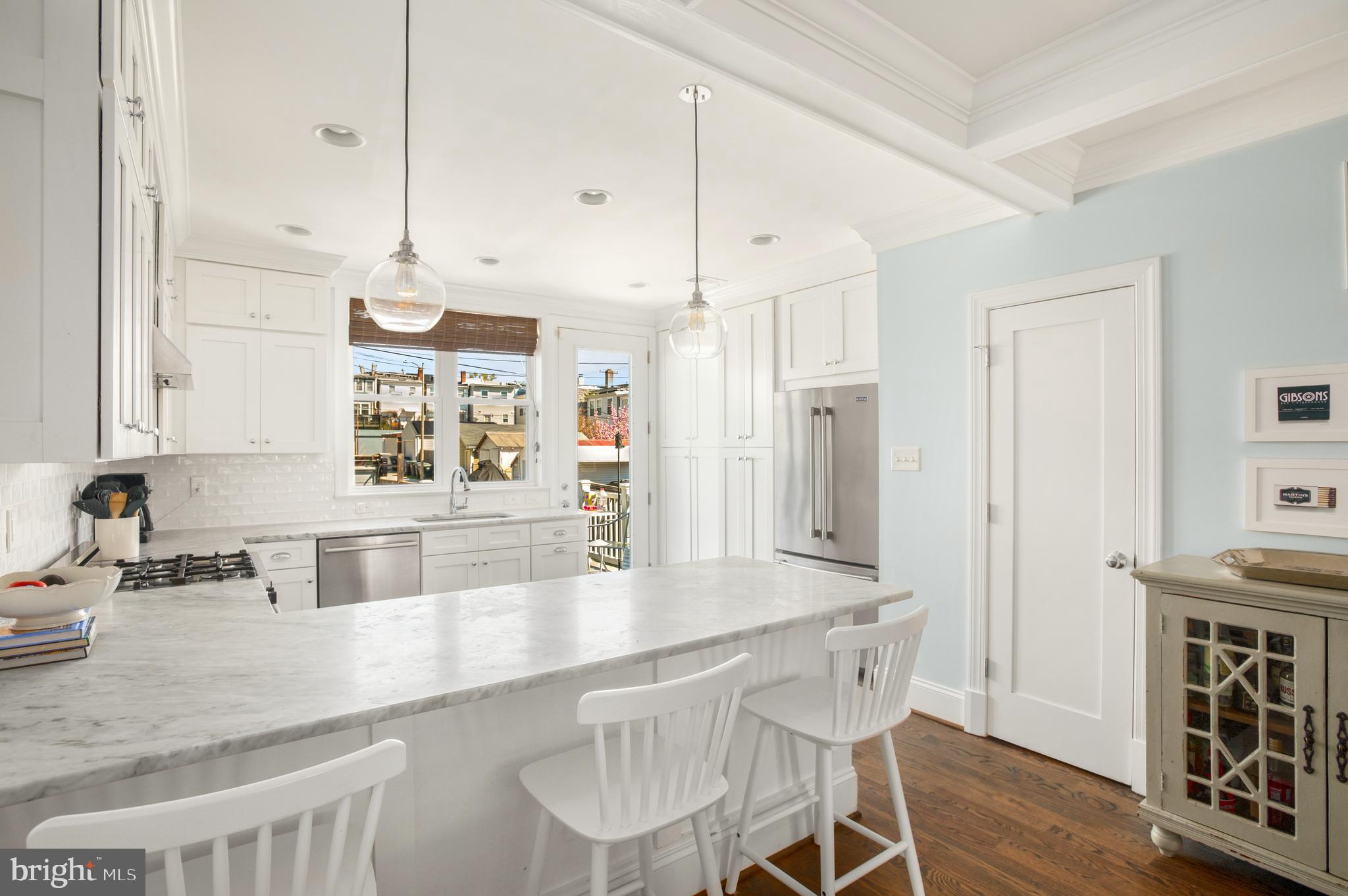 717 Hamilton Street Northwest Washington, DC 20011 - Photo 8 of 27 a kitchen with stainless steel appliances granite countertop a sink counter space and wooden floor