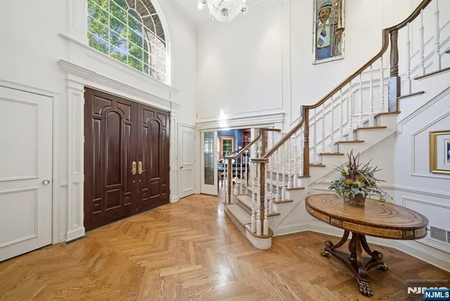 a view of entryway livingroom and hall