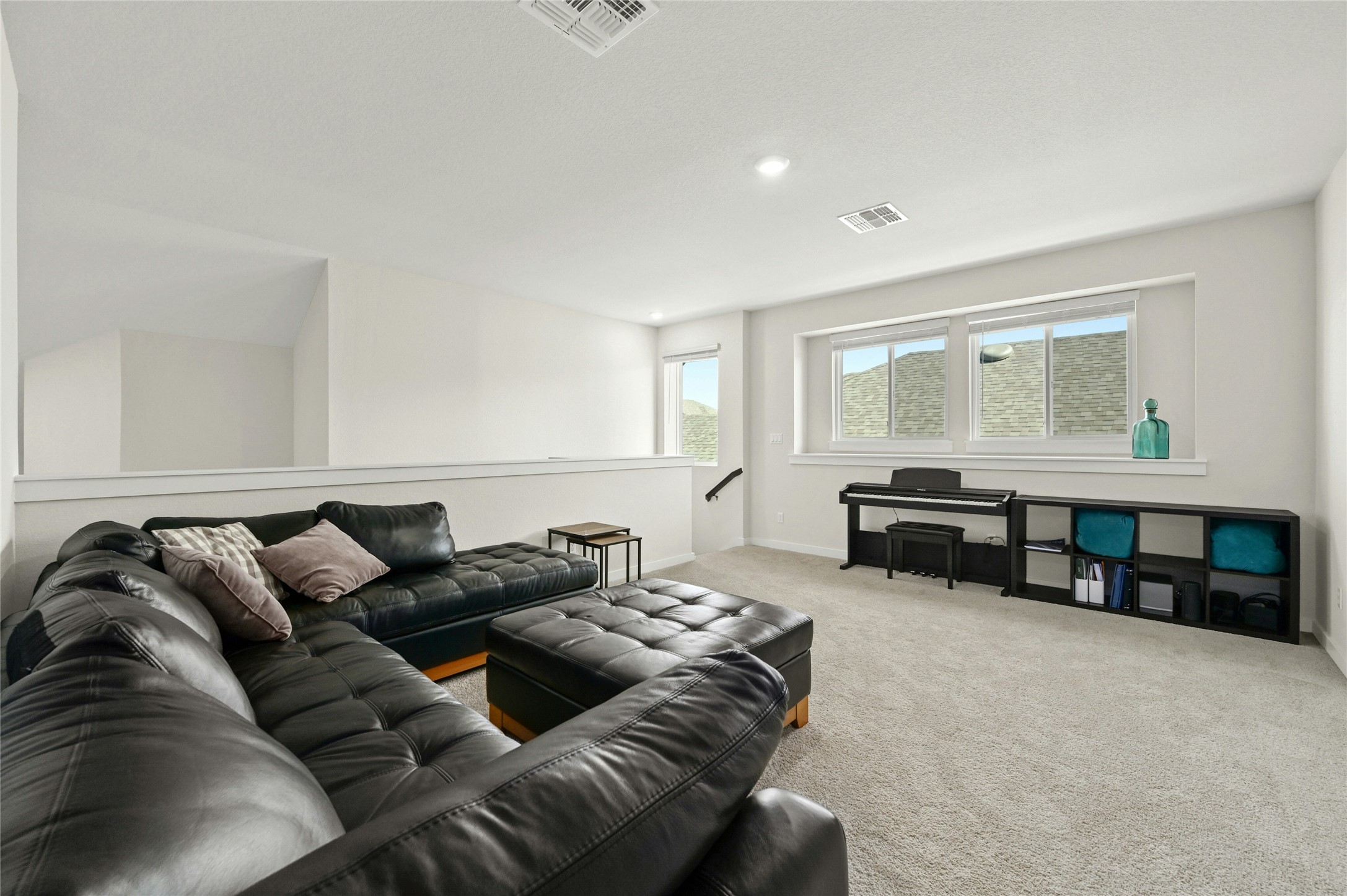 916 Leaning Oak Lane Georgetown, TX 78628 - Photo 22 of 32 Living area featuring carpet floors and recessed lighting