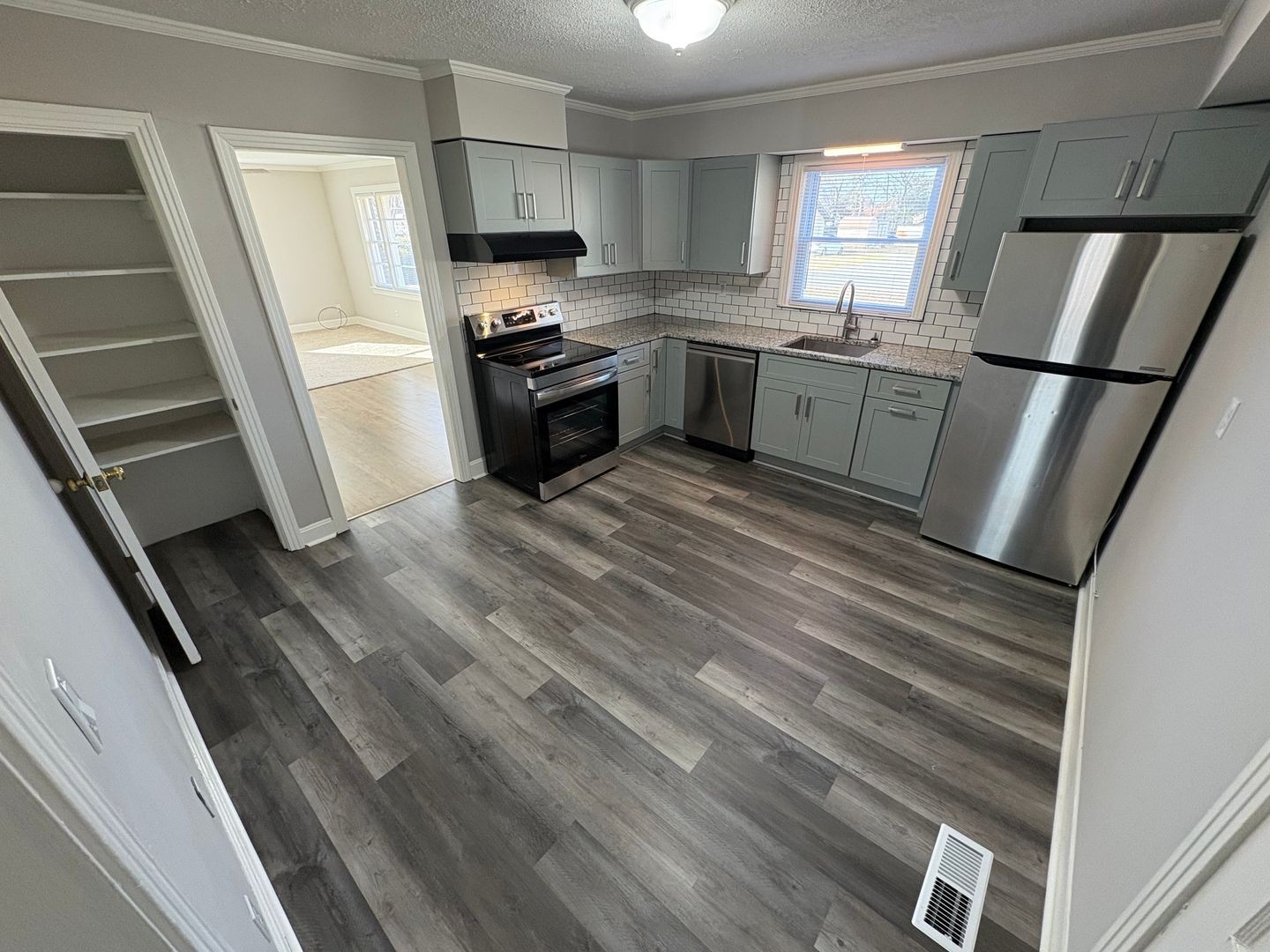 397 Franklin Road Lebanon, TN 37087 - Photo 2 of 8 a kitchen with stainless steel appliances granite countertop a refrigerator stove a sink and dishwasher