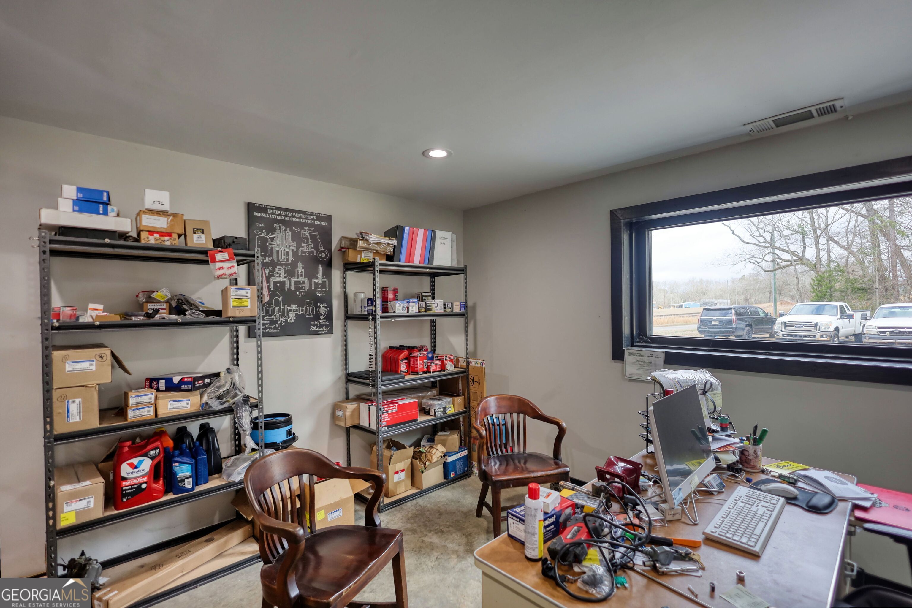 200 Railroad Street Monticello, GA 31064 - Photo 12 of 45 a room with furniture toys and a large window