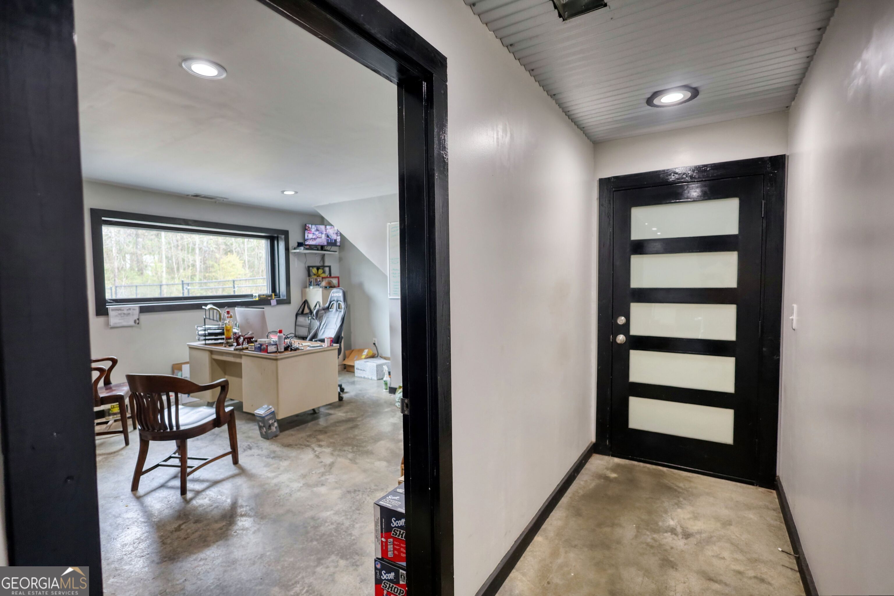 200 Railroad Street Monticello, GA 31064 - Photo 15 of 45 a very nice looking room with a large window and wooden floor