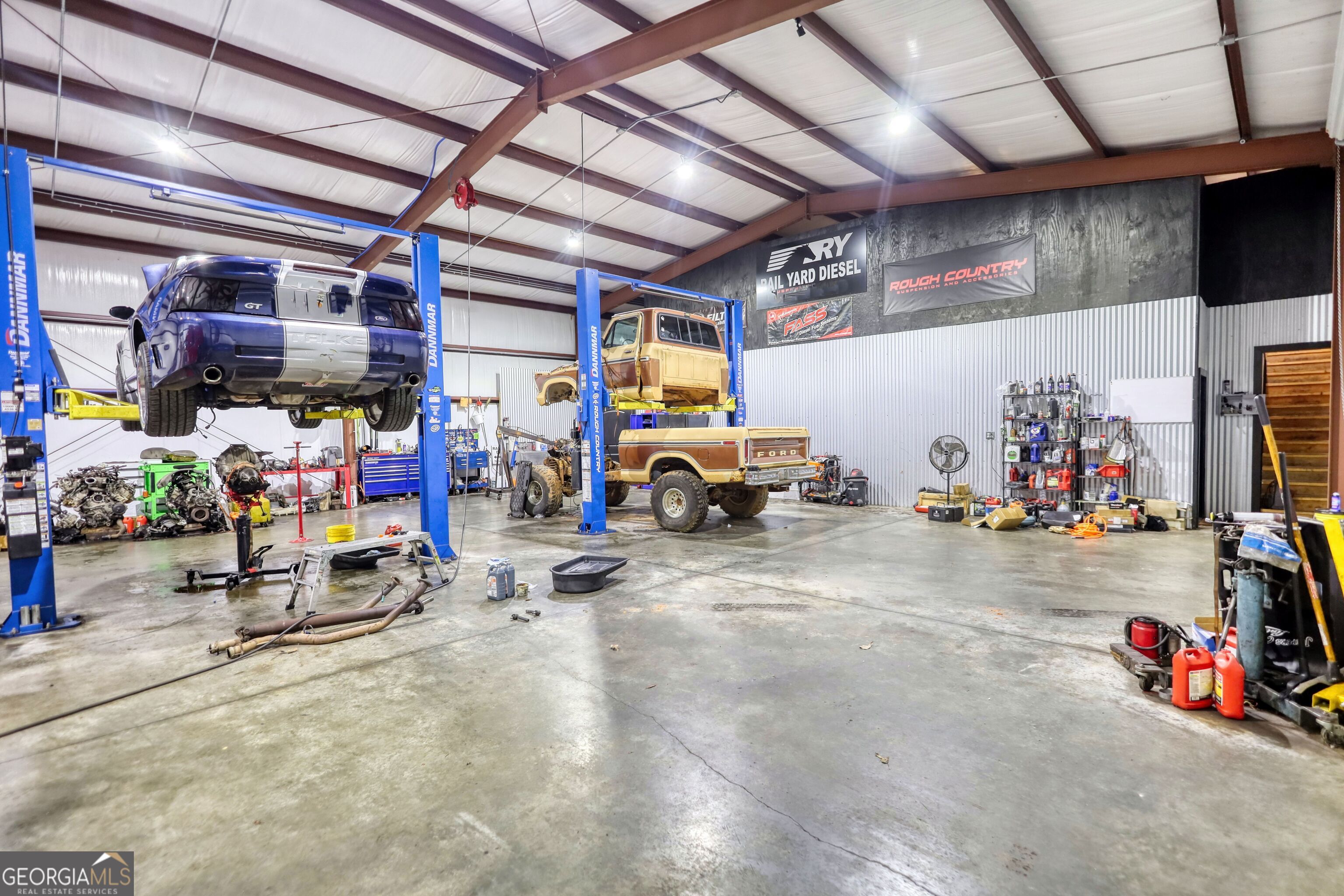200 Railroad Street Monticello, GA 31064 - Photo 18 of 45 a view of parking garage with cars
