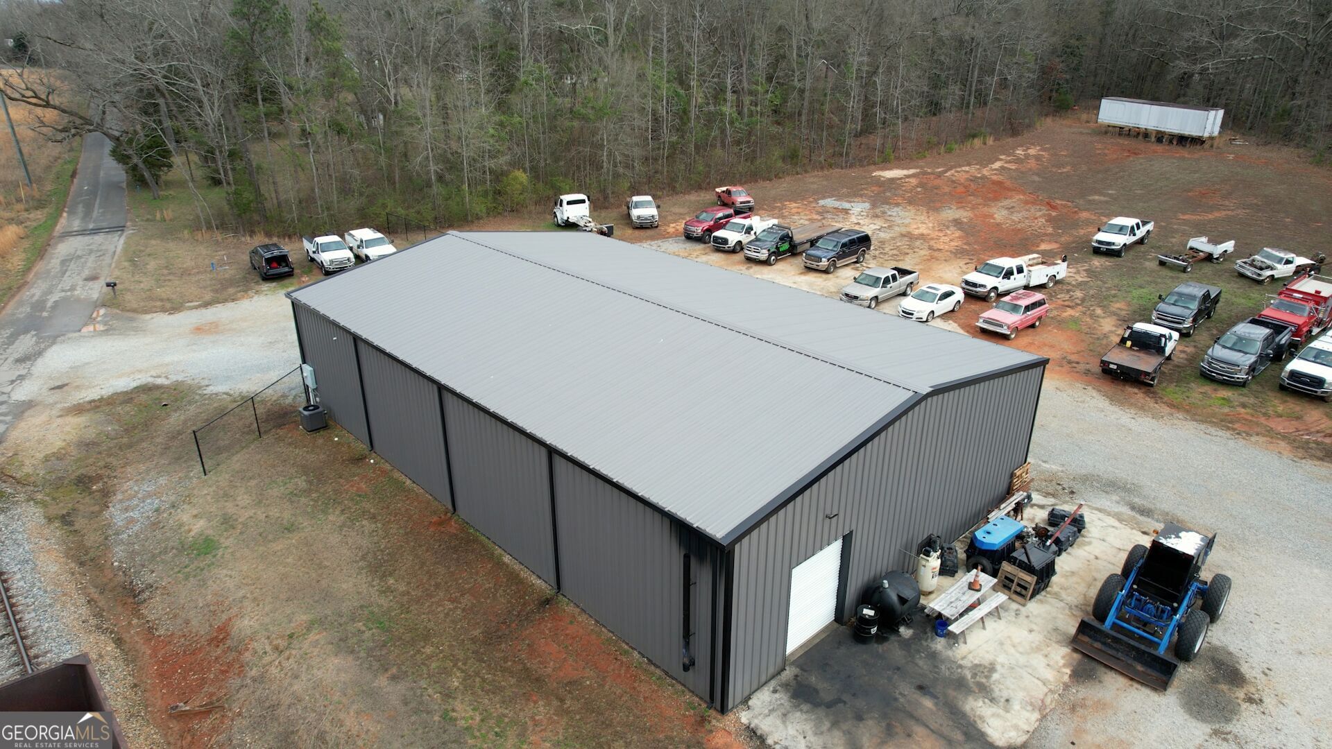 200 Railroad Street Monticello, GA 31064 - Photo 2 of 45 a view of a couches in the patio