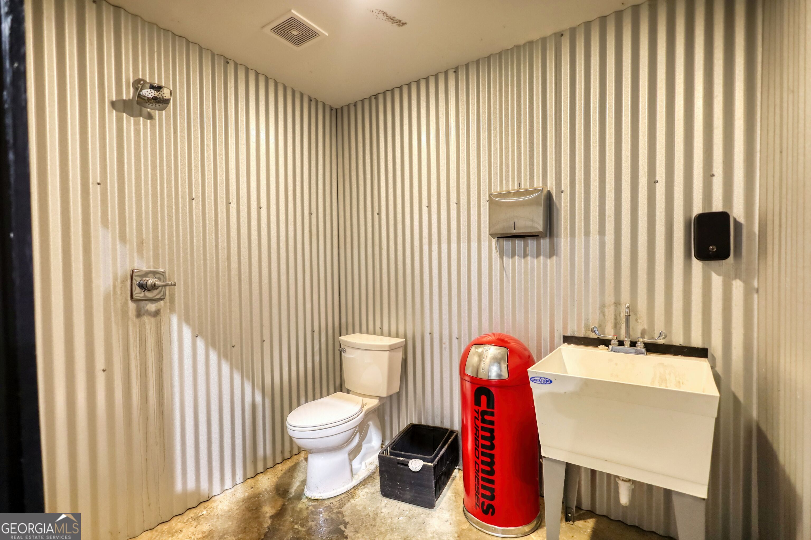 200 Railroad Street Monticello, GA 31064 - Photo 22 of 45 a bathroom with a toilet and a sink