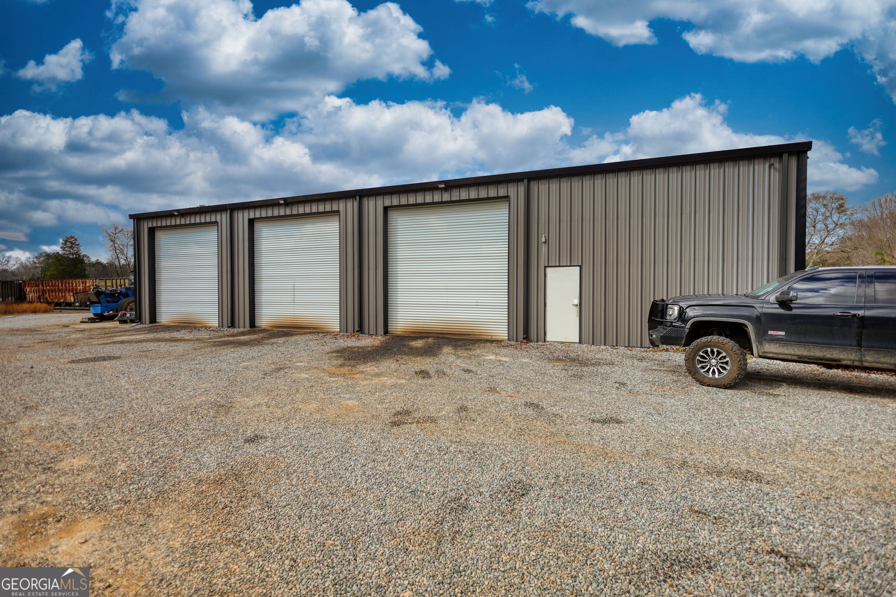 200 Railroad Street Monticello, GA 31064 - Photo 31 of 45 a car parked in front of a house