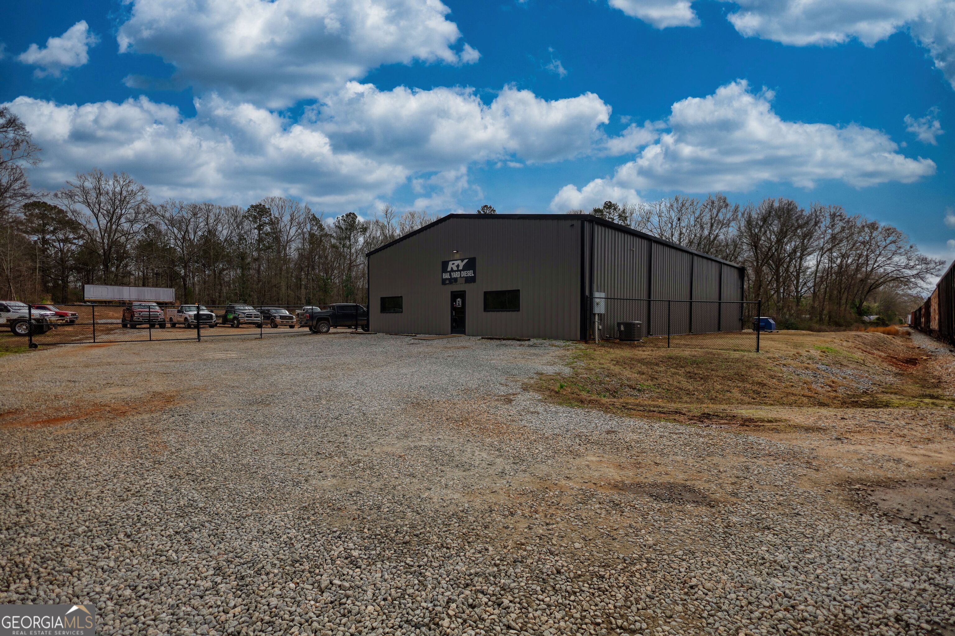 200 Railroad Street Monticello, GA 31064 - Photo 40 of 45 a view of a house with a yard